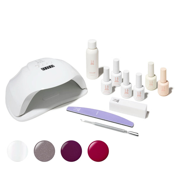 Shimmers & Chrome Gel Kit with lamp, nail polish bottles, and tools on a white background