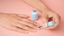 a hand applying 14 day mani gel break nail strengthener