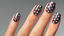 hand with short square nails with glossy brown nails and light blue polka dots