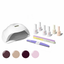 Nail care set with lamp, nail polish bottles, files, and color swatches on a white background
