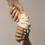 Hand holding a ice cream cone with a neutral background - 14 Day Mani summer gel polish shades