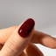 Main Character - dark brown red gel nail polish